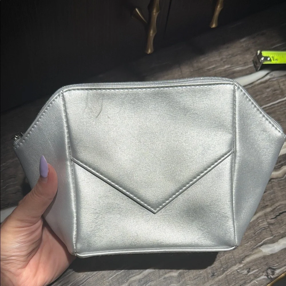 La Prairie Silver Cosmetic Bag with Geometric Design